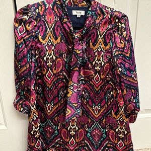 Vibrant mini dress with tie at neck. Size M.